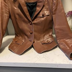 Burberry short lamb skin blazer.
